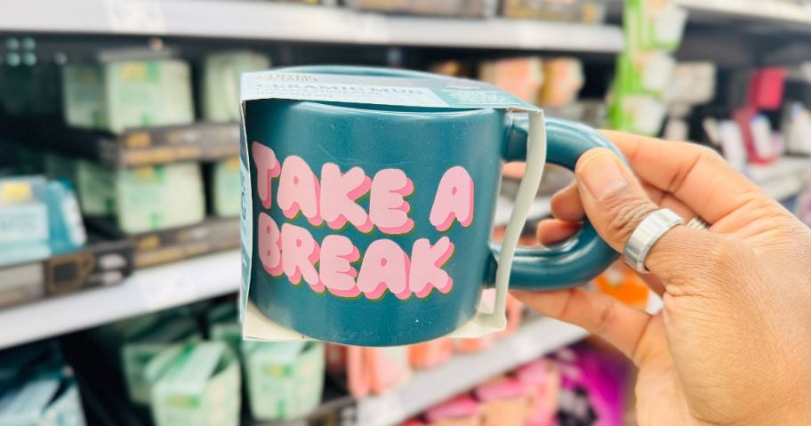 Thyme & Table Take a Break mug in hand in store