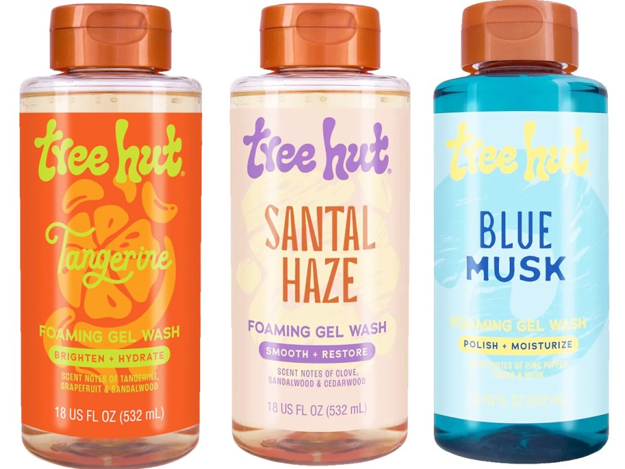 three bottles of Tree Hut Body Wash in a row