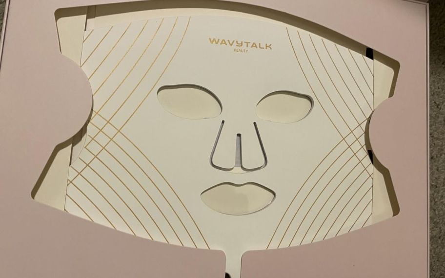 Wavy talk redlight mask inside of its box 