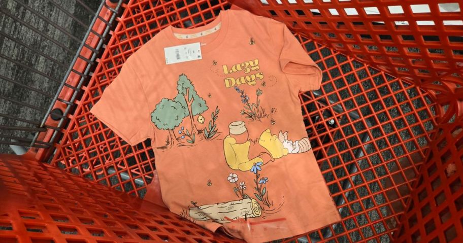 Winnie the Pooh shirt inside of shopping cart