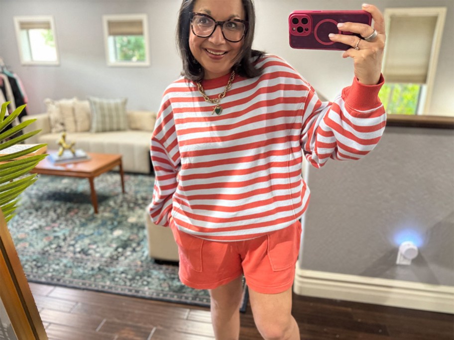 Woman wearing Aerie Sweatshirt and Shorts