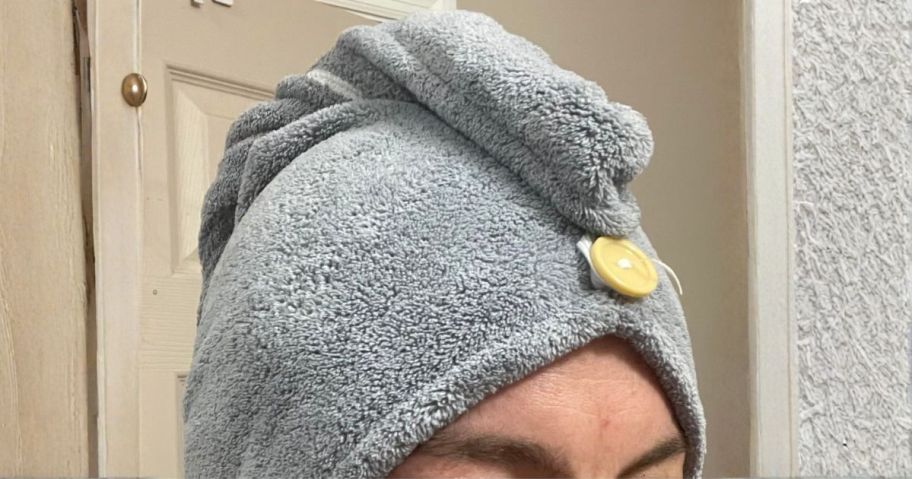 woman wearing microfiber hair towel