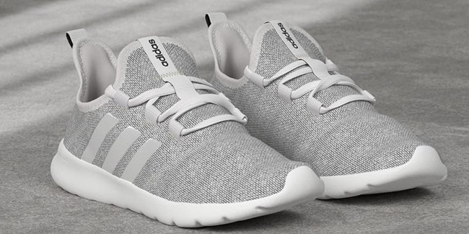 gray and white adidas shoes 