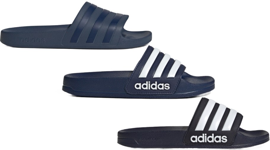 Three navy and black Adidas slides with white stripes are displayed against a white background.