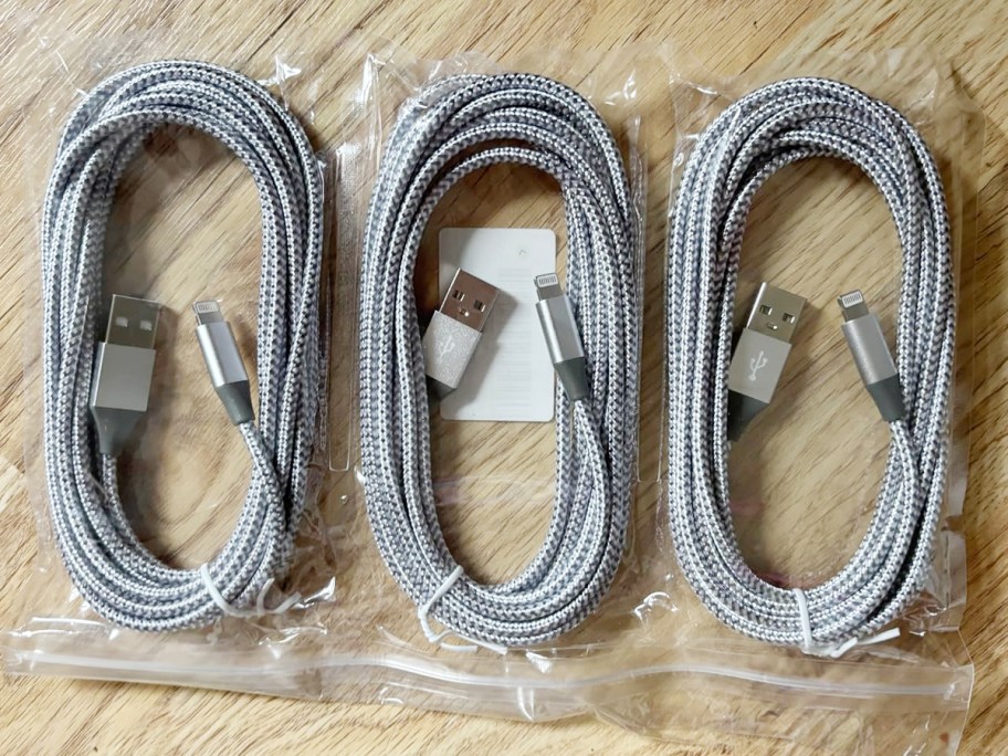 three gray iphone chargers
