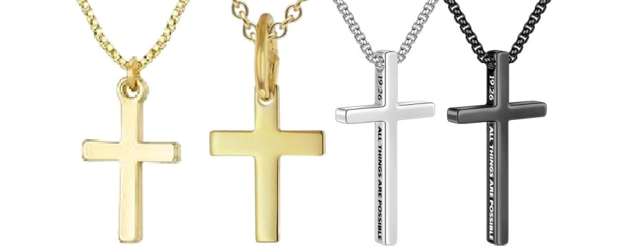 Four cross necklaces displayed: one in yellow gold, one in a gold tone, one in silver, and one in black.