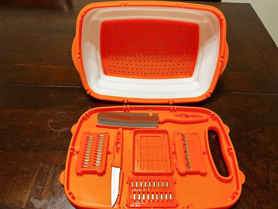 orange and white cutting board with accessories 