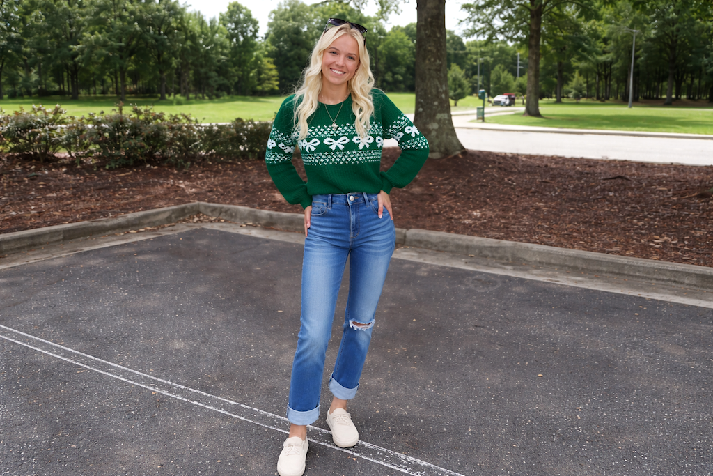 woman wearing Amazon sweater with jeans 