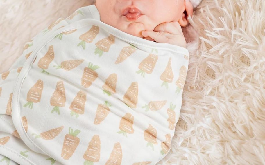 Cute baby inside swaddle
