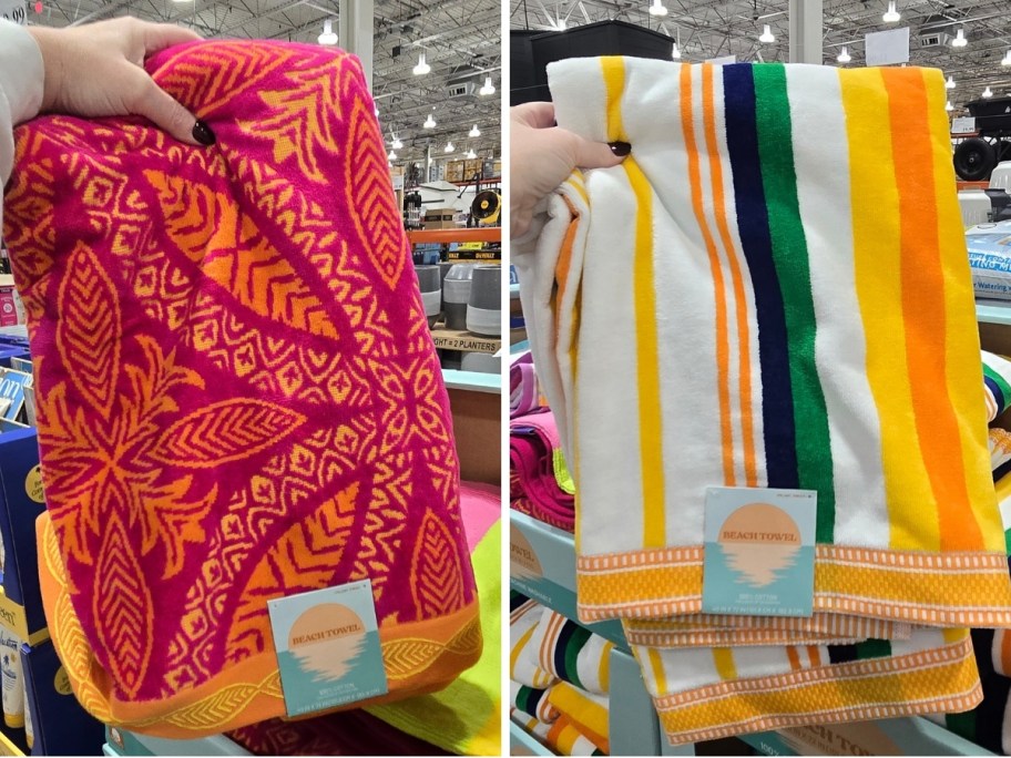 womans hand holding up 2 beach towels in different prints