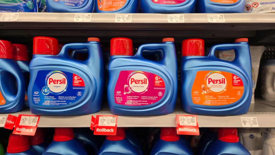 bottles of persil detergent on a store shelf