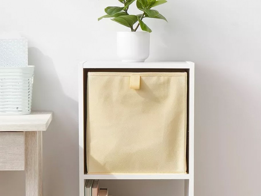 yellow fabric bin in container