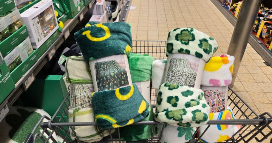 cart filled with throw blankets inside