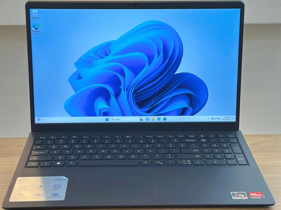 dell laptop open on table