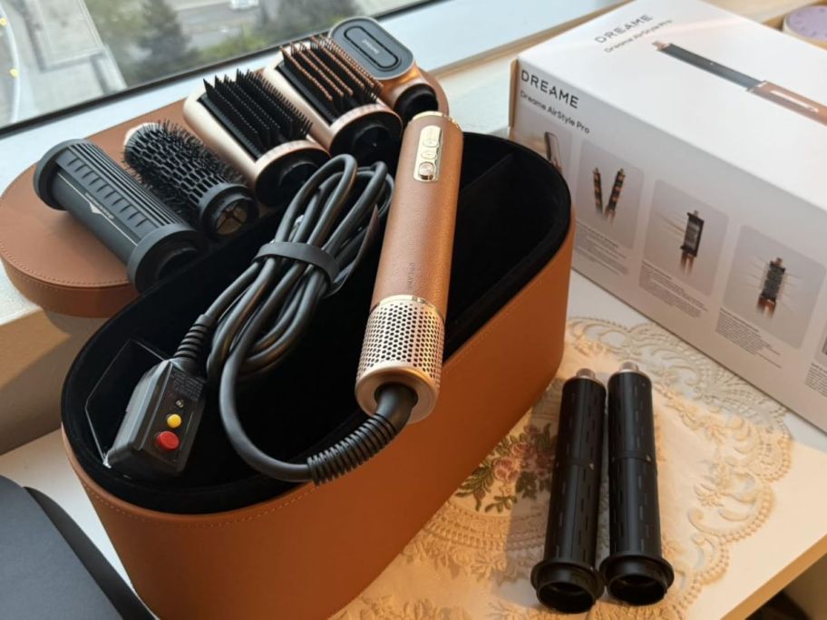 dreame hair dryer with all the items on display 