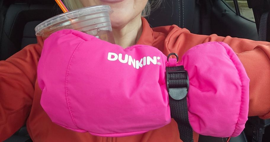 Dunkin pink glove with drink in it