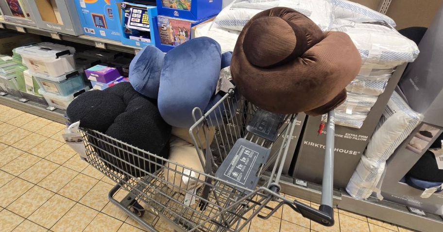 multiple color knot pillows inside of shopping cart