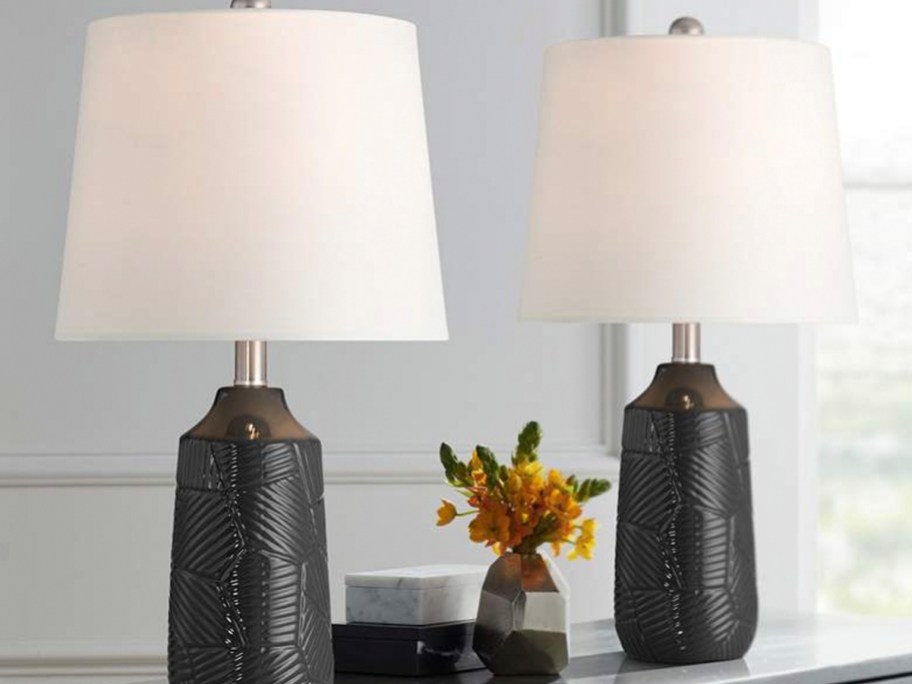 black and white lamps on table