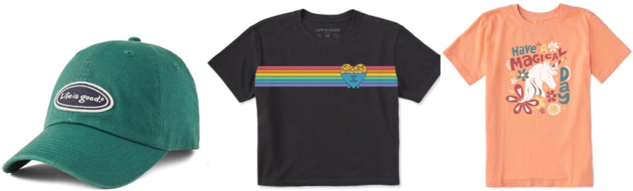 A green baseball cap with "Life is good" text, a black T-shirt with rainbow stripes and heart design, and an orange T-shirt with unicorn and "Have a Magical Day" text.