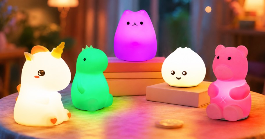 variety of colorful animal night lights on a table