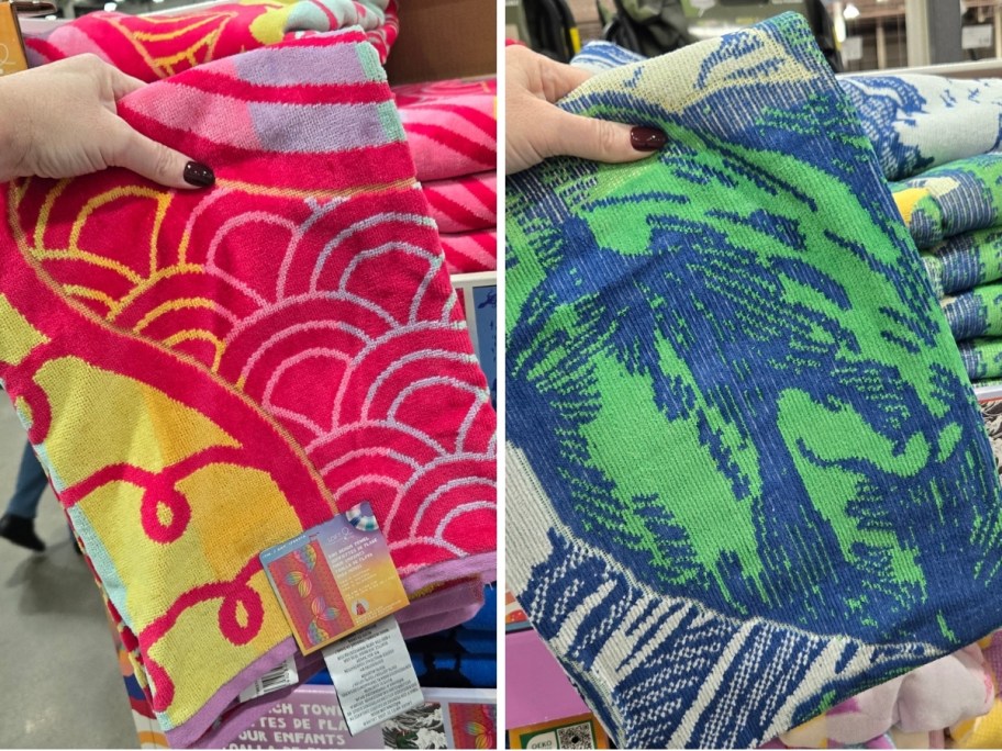 womans hand holding up 2 beach towels in different prints