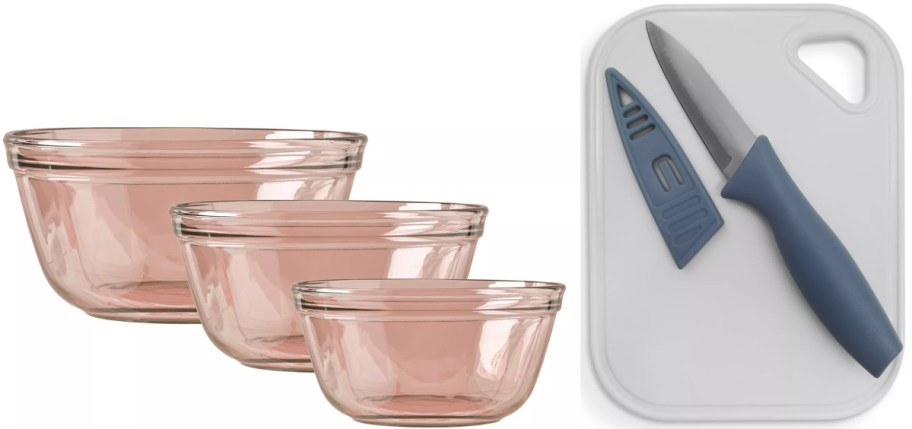Three pink glass mixing bowls in three different sizes are placed beside a white cutting board with a blue-handled knife and sheath on the right.