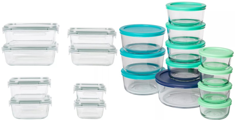 A set of clear glass storage containers with green, teal, and blue lids. Various sizes are stacked in an organized manner on a white background.