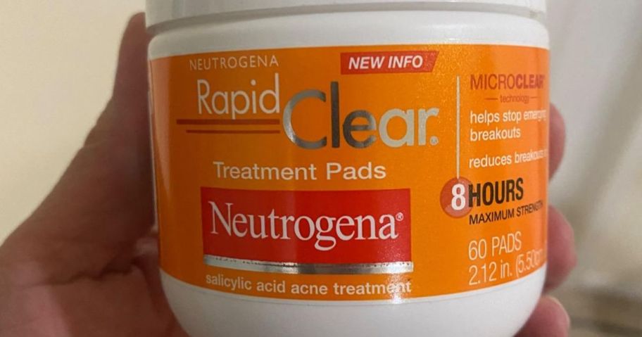 hand holding neutrogena treatment pads