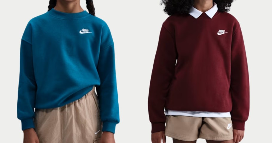 two girls wearing Nike sweatshirts