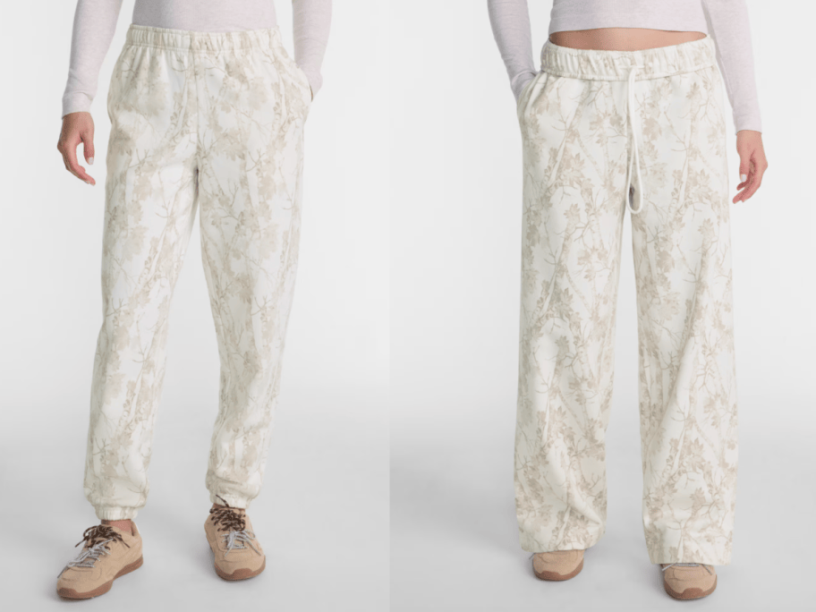 2 women in white sweatpants