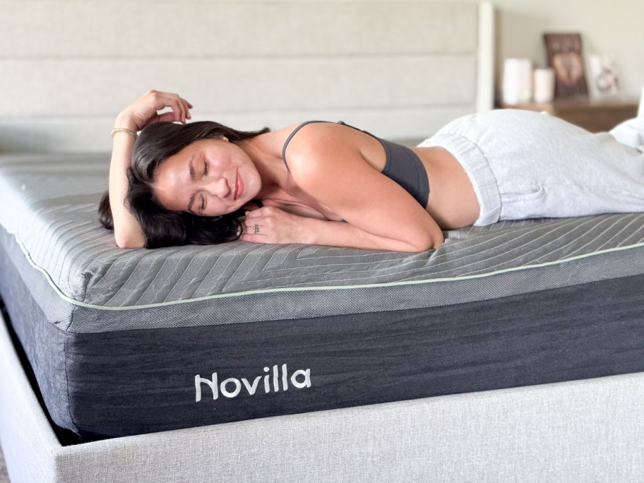 woman laying on a mattress