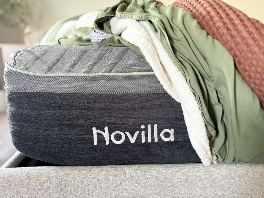 Bed with Novilla mattress and blanket