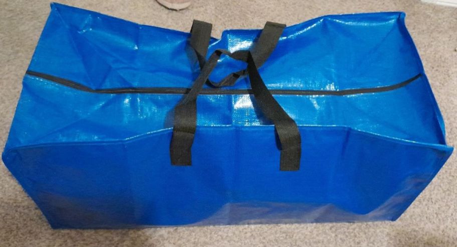 packing bags in blue on the floor