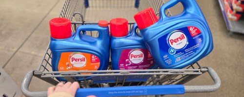 three bottles of persil in a shopping cart