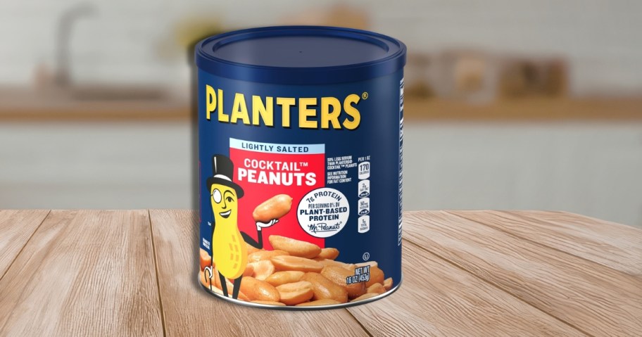 a container of Planters lightly salted cocktail peanuts