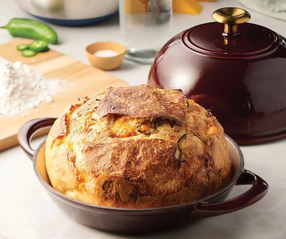 dutch oven with bread on kitchen counter