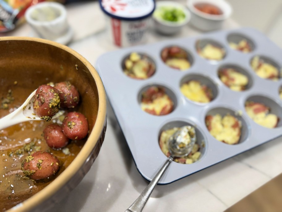 seasoned roasted poatoes in muffin pan 
