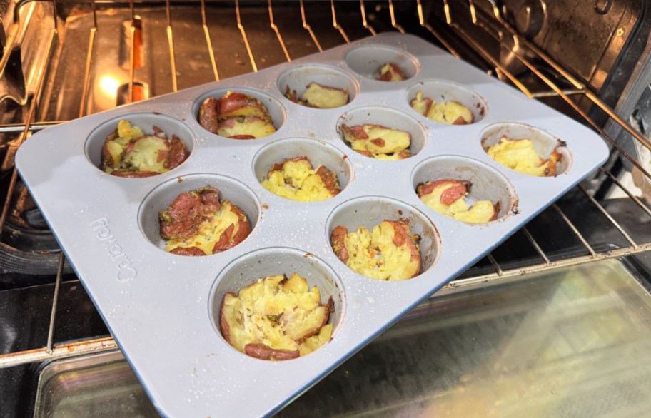 smashed crispy potatoes inside a muffin pan