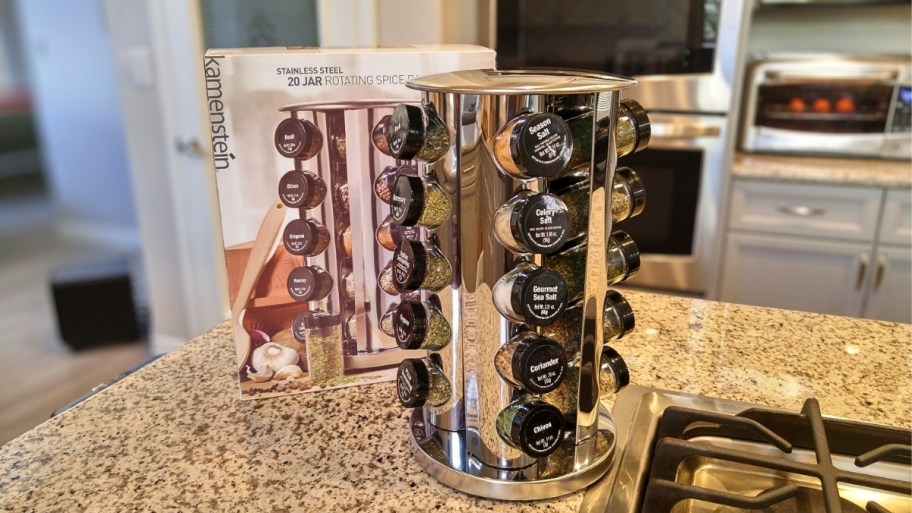 spinning spice raCK ON a counter next to a stovetop