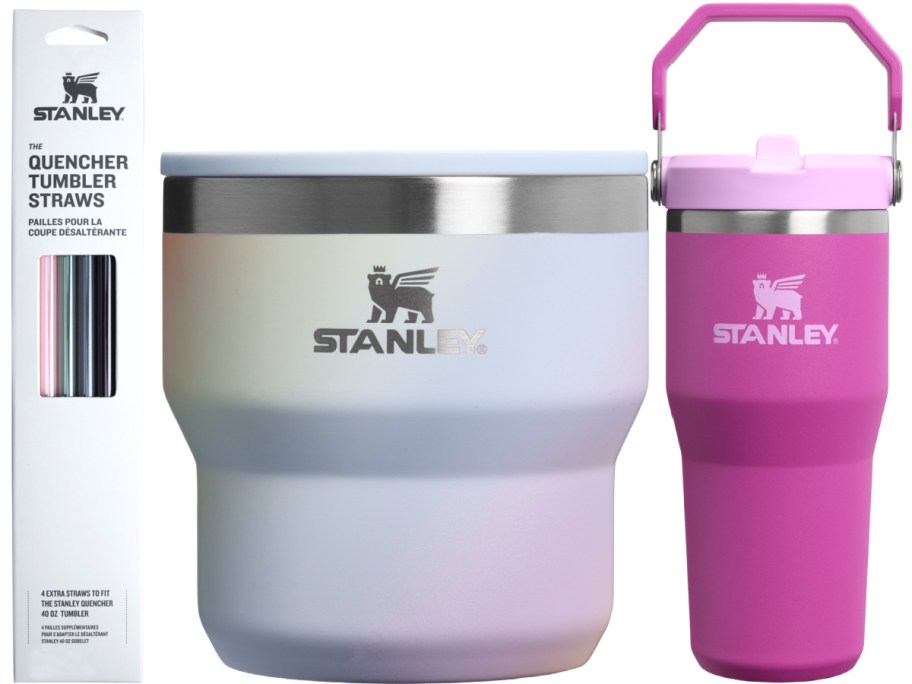 A Stanley Quencher tumbler set featuring pastel colors. Includes a large ombre tumbler, pink tumbler with handle, and straws in a box.