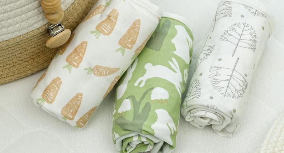 three swaddles on top of the table