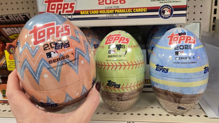 Woman's hand reaching for an Easter egg