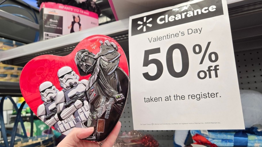 womans hand holding a starwars tin of valentines candy