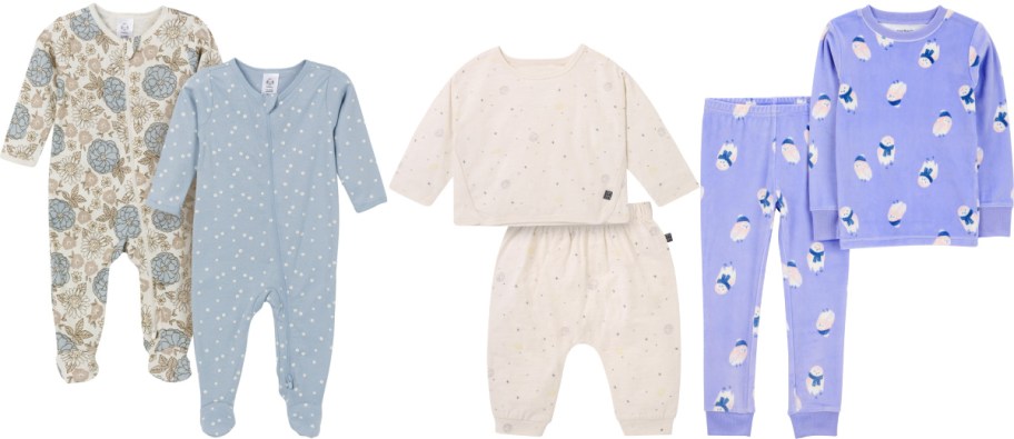 Four sets of baby pajamas are displayed. From left: floral pattern, light blue with polka dots, cream with subtle dots, and purple with penguin prints.
