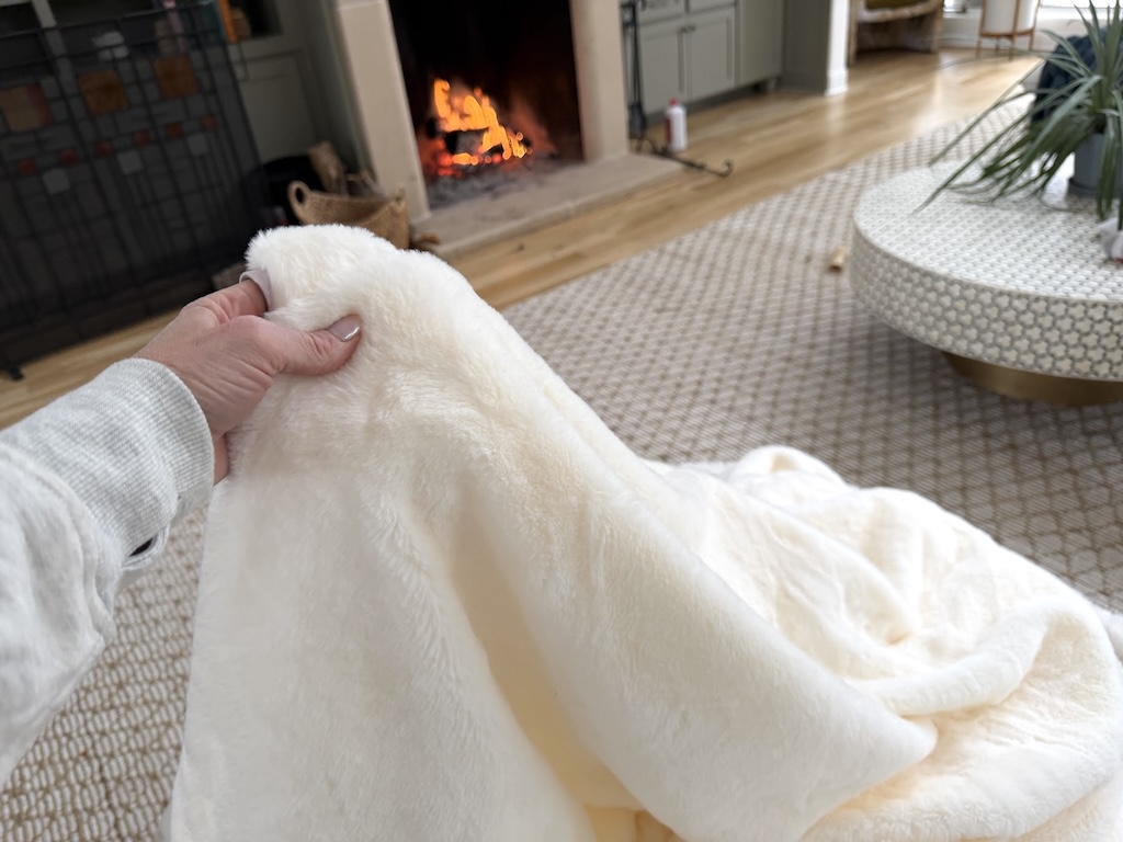 holding Walmart blanket 