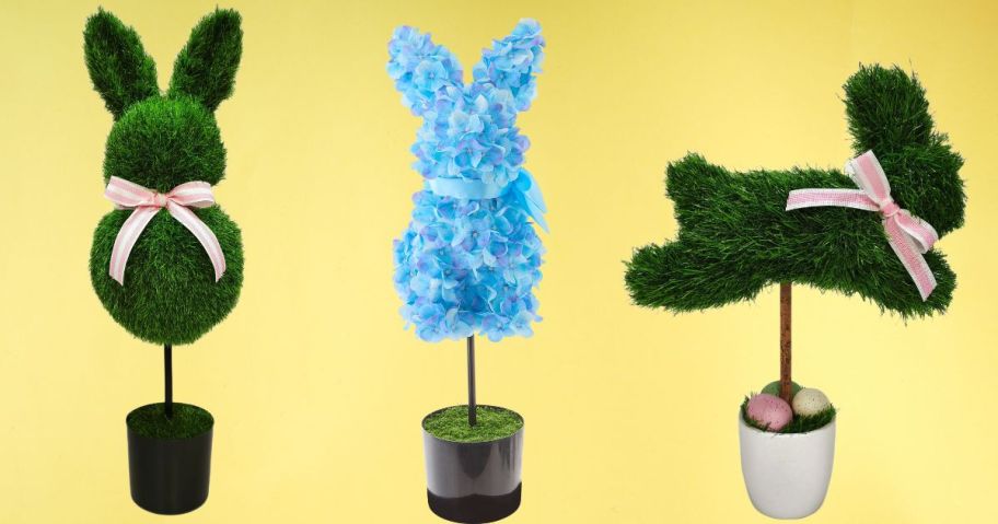 three bunny topiaries against yellow background