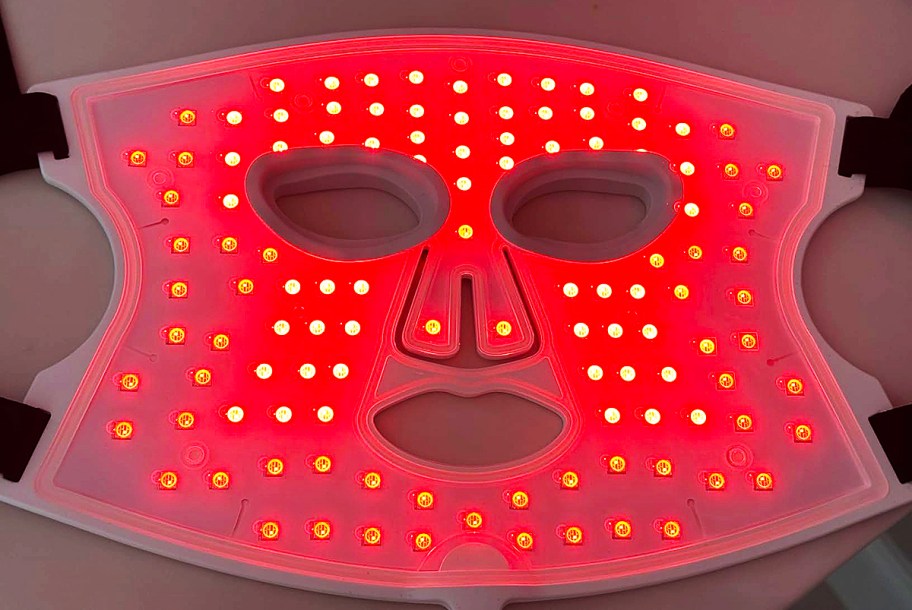 red light therapy mask sitting on a table