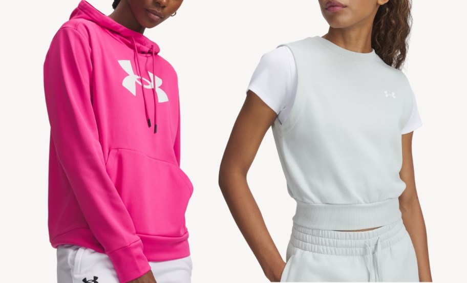 woman in a pink hoodie with woman wearing a green sleeveless fleece top