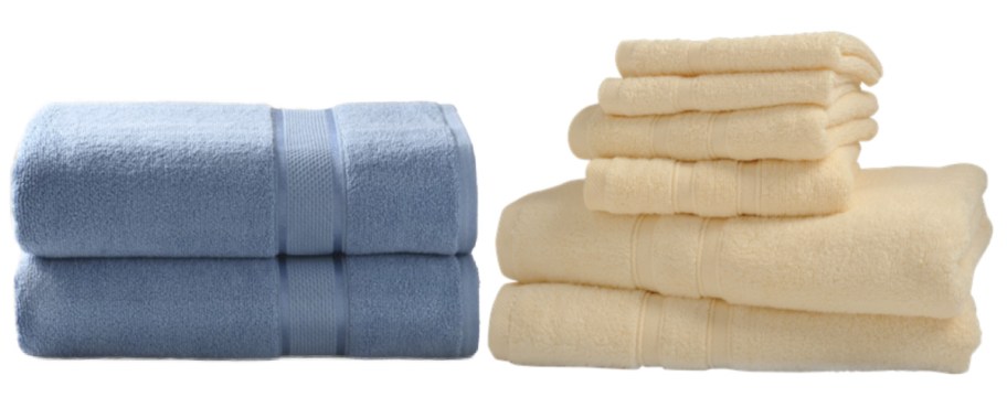 two blue towels stacked and ivory towels stacked