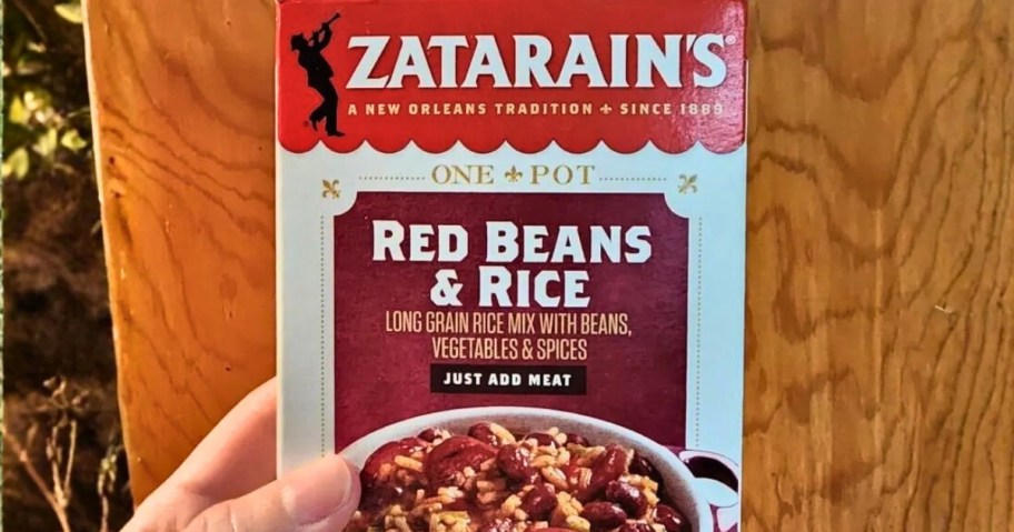 hand holding a box of Zatarains Red Beans & Rice